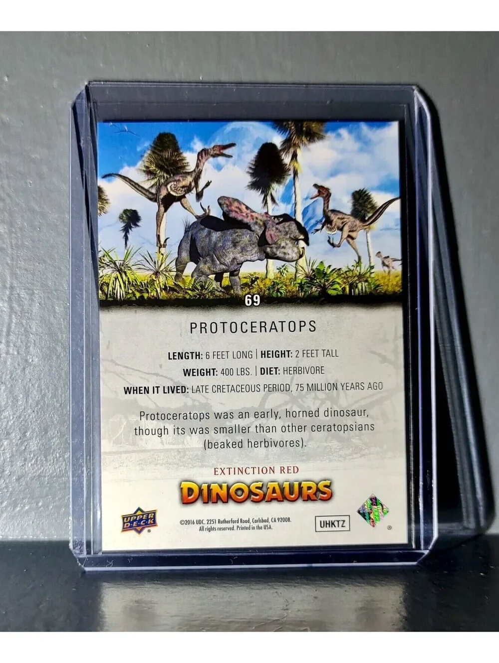 2015 Upper Deck Dinosaurs Protoceratops Extinction Red Parallel #69 Card